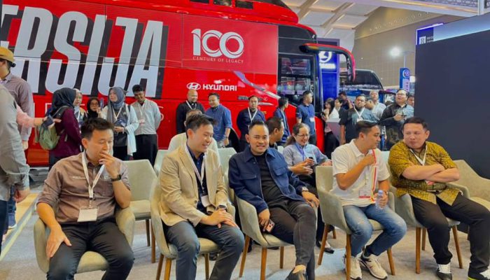 Debut di Busworld 2026, Juragan99 Trans Perkenalkan Bus Premium Berfitur Bioskop Berjalan